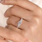 Graduated Round Cut Cascading Side Stone Cluster Ring