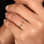 Modern Bypass Emerald & Trillion Cut Diamond Ring