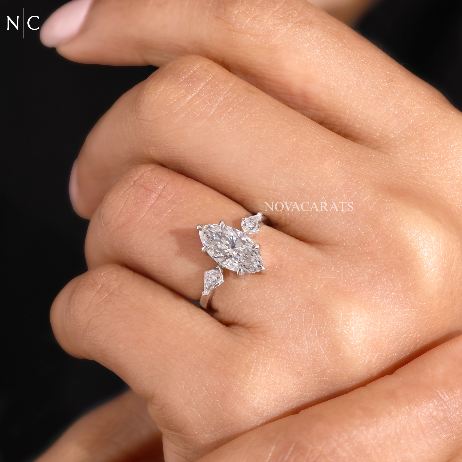 Modern Marquise Kite Side Stone Solitaire Ring