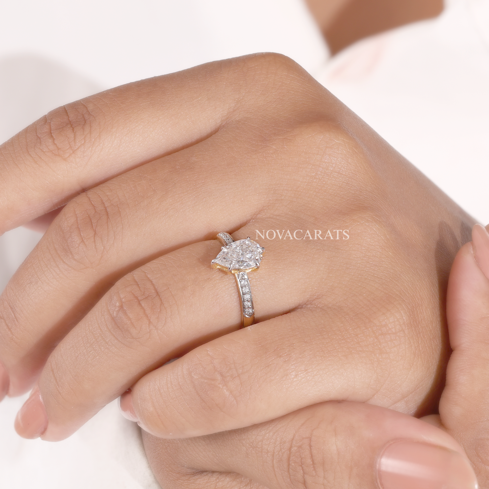 Pear Cut Hidden Halo Solitaire Ring