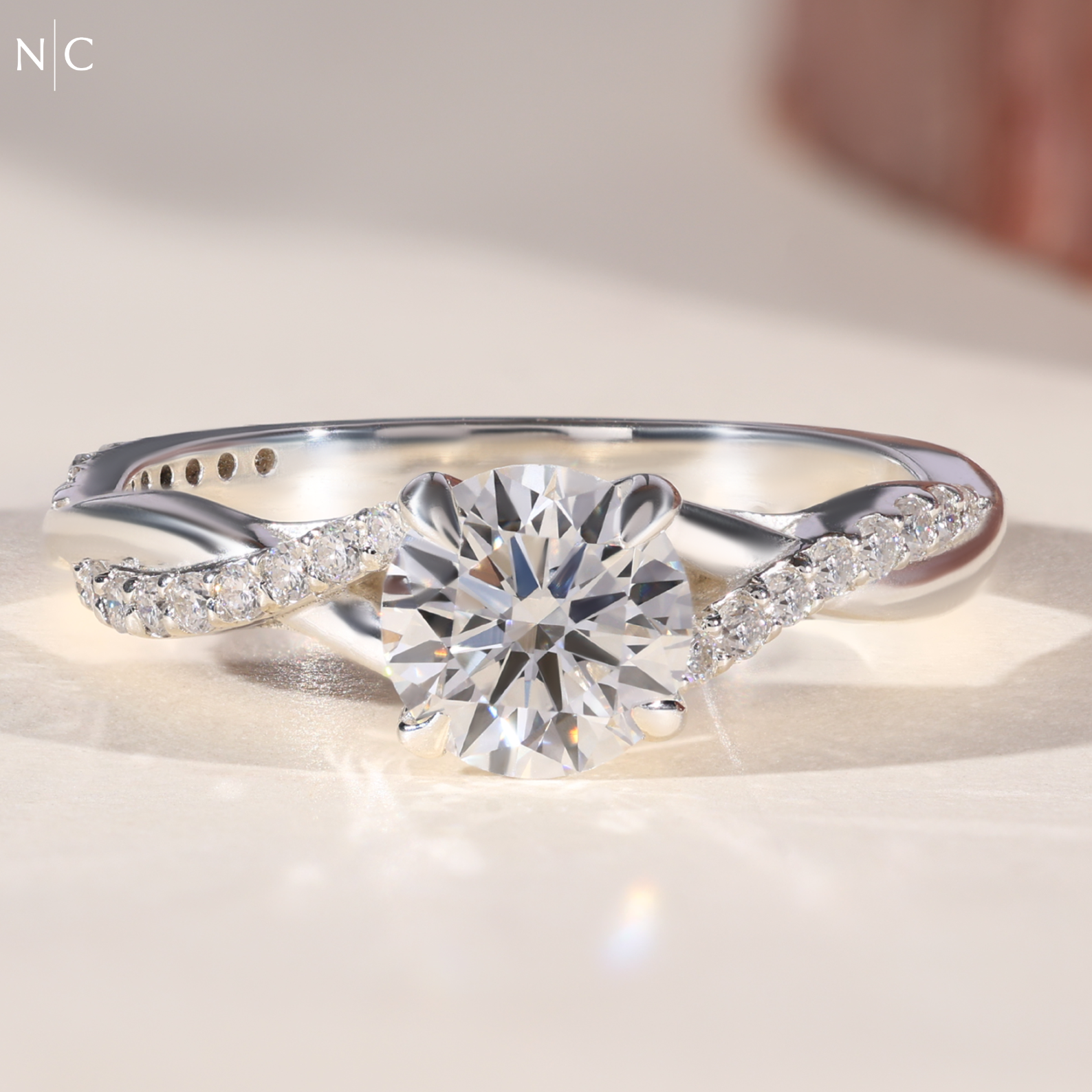 Round Cut Infinity Twist Ring