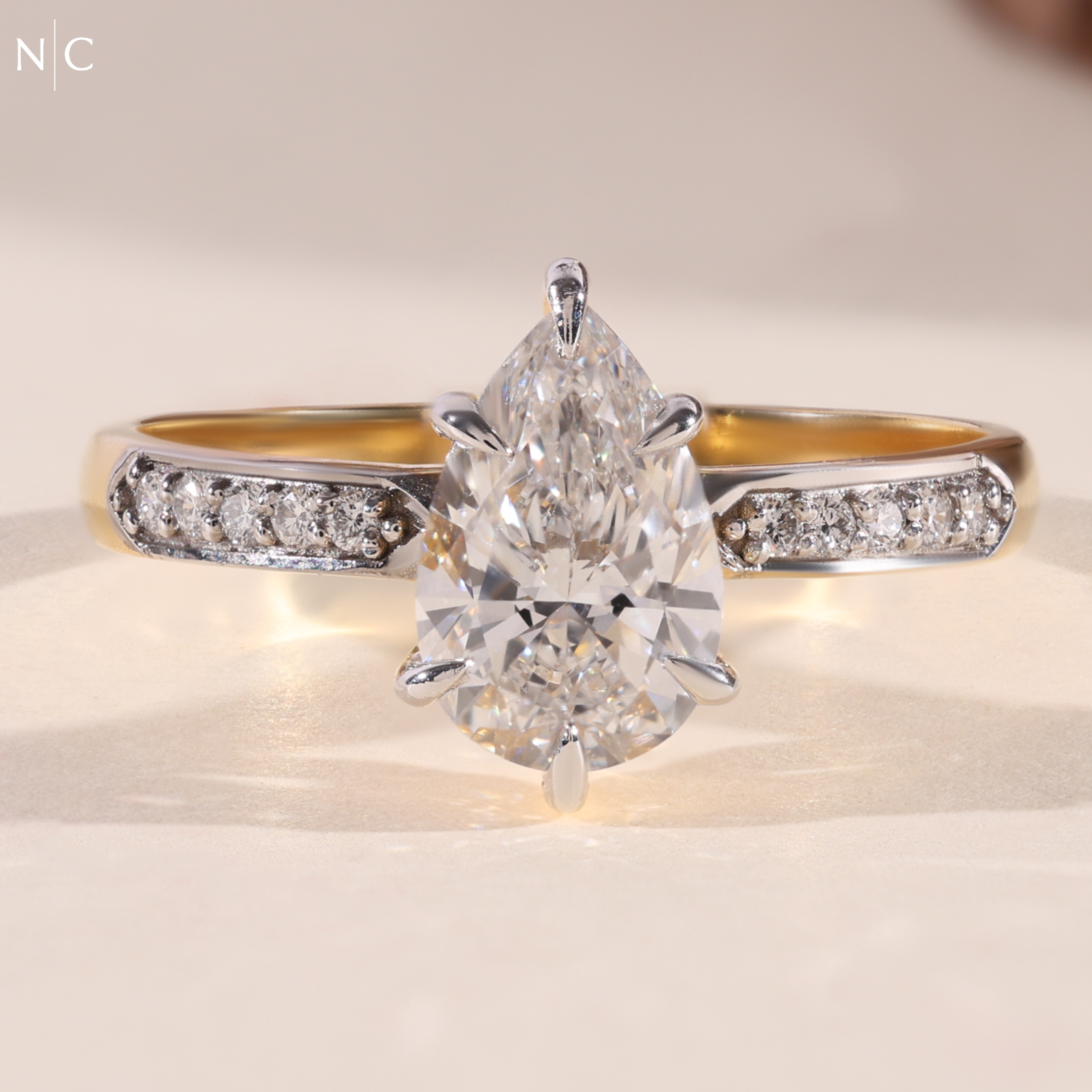 Pear Cut Hidden Halo Solitaire Ring