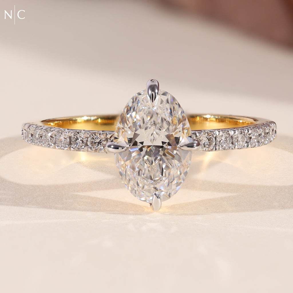 Oval Cut Unique Solitaire Engagement Ring