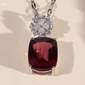 Cushion Cut Ruby Flower Accent Pendent
