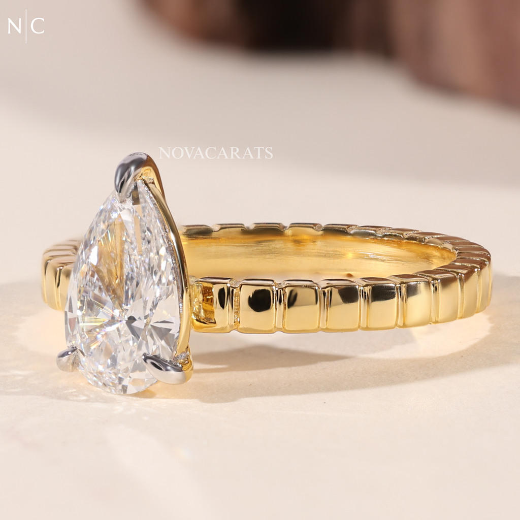 Pear Cut Solitaire Engagement Ring