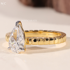 Pear Cut Solitaire Engagement Ring