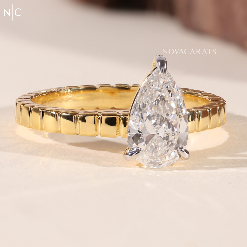Pear Cut Solitaire Engagement Ring