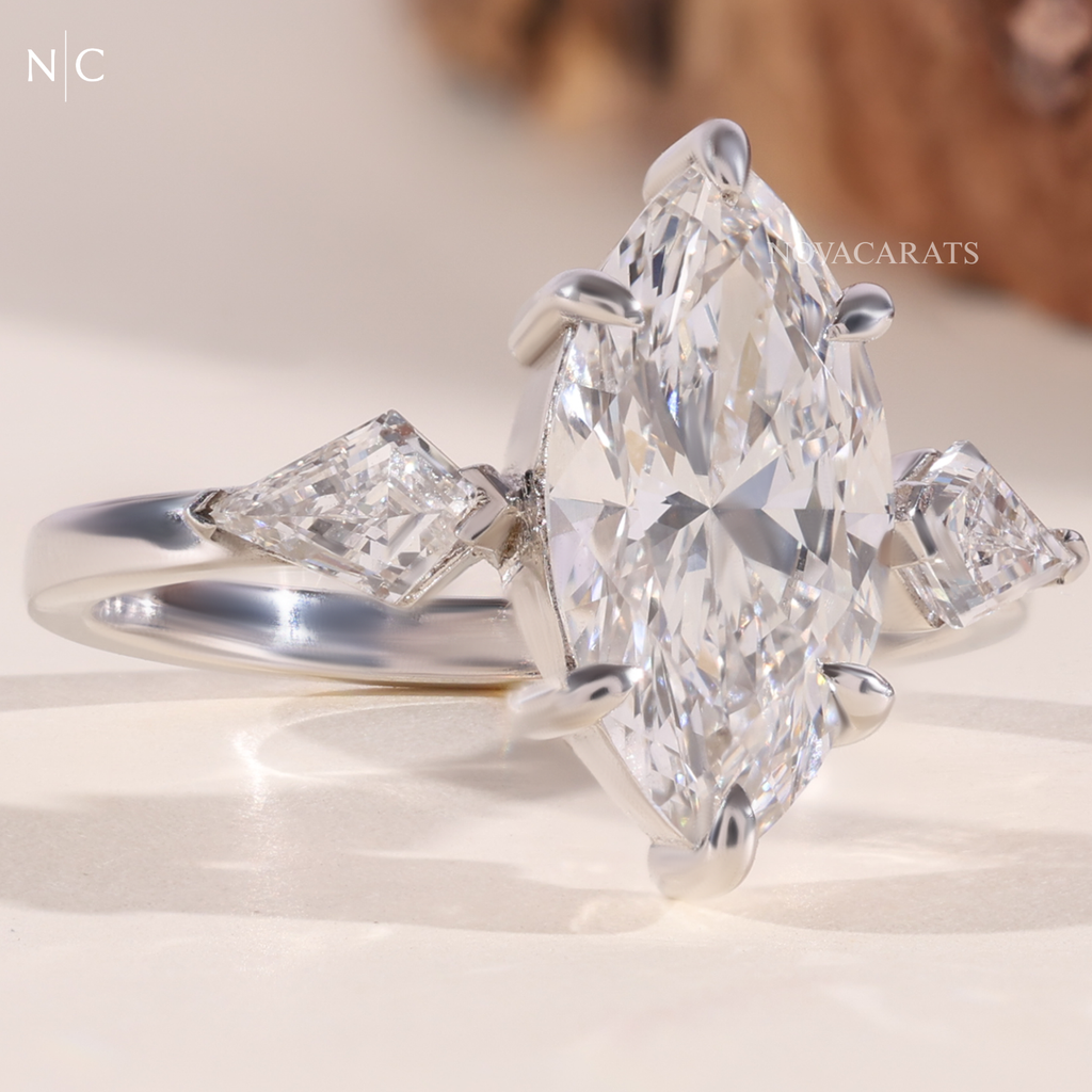 Modern Marquise Kite Side Stone Solitaire Ring