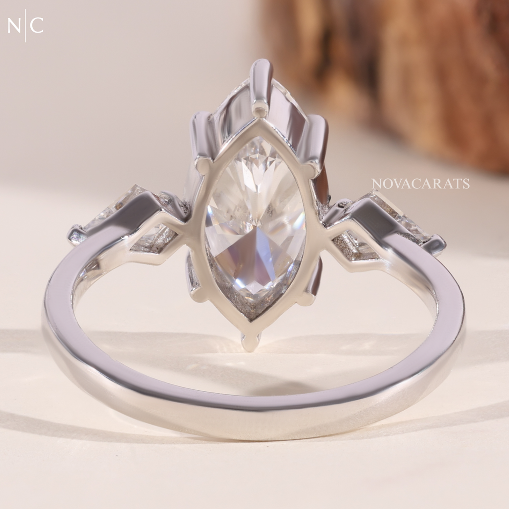 Modern Marquise Kite Side Stone Solitaire Ring