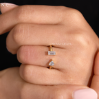 Modern Bypass Emerald & Trillion Cut Diamond Ring