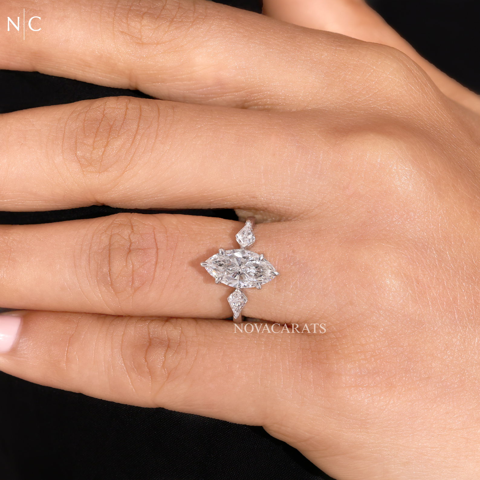 Modern Marquise Kite Side Stone Solitaire Ring