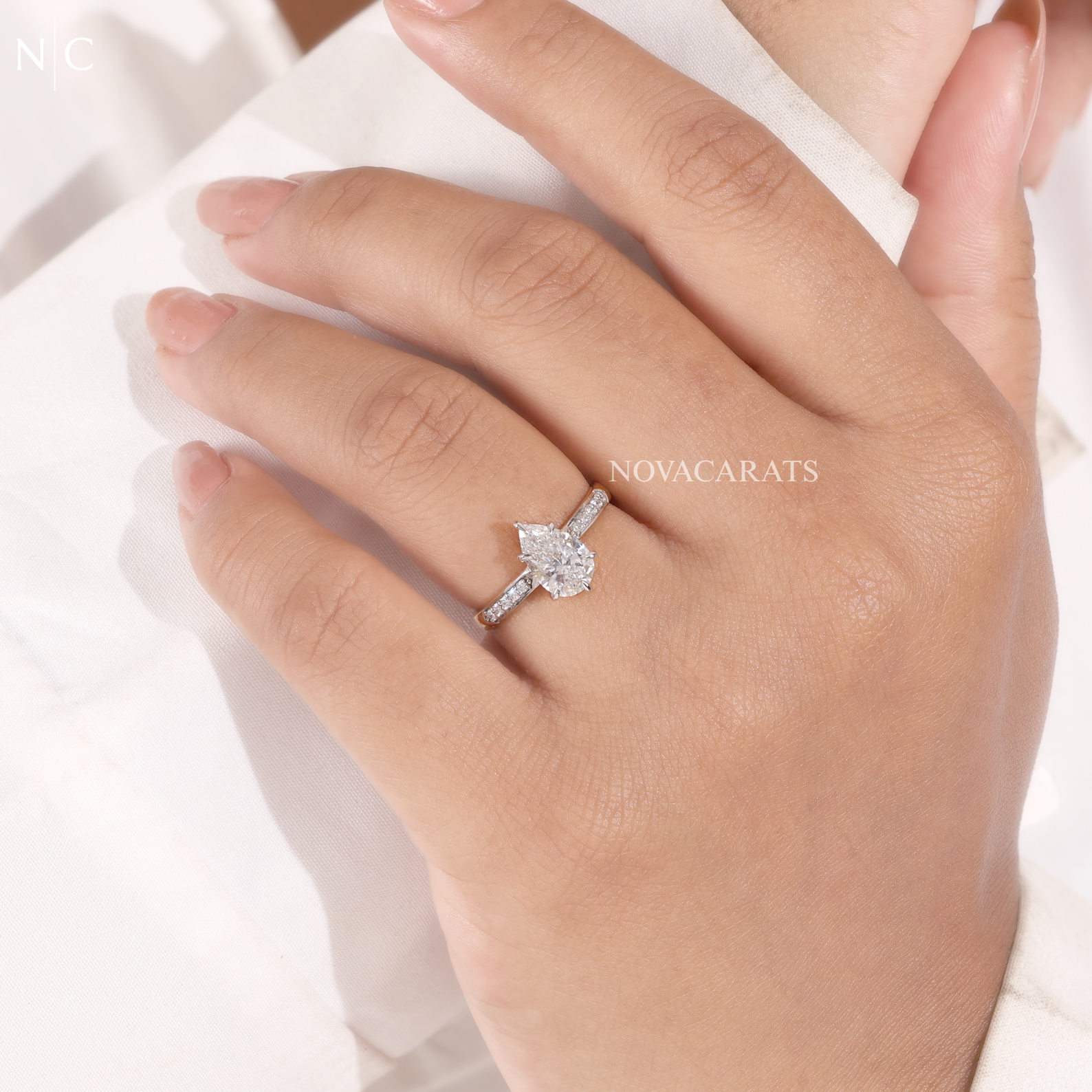 Pear Cut Hidden Halo Solitaire Ring