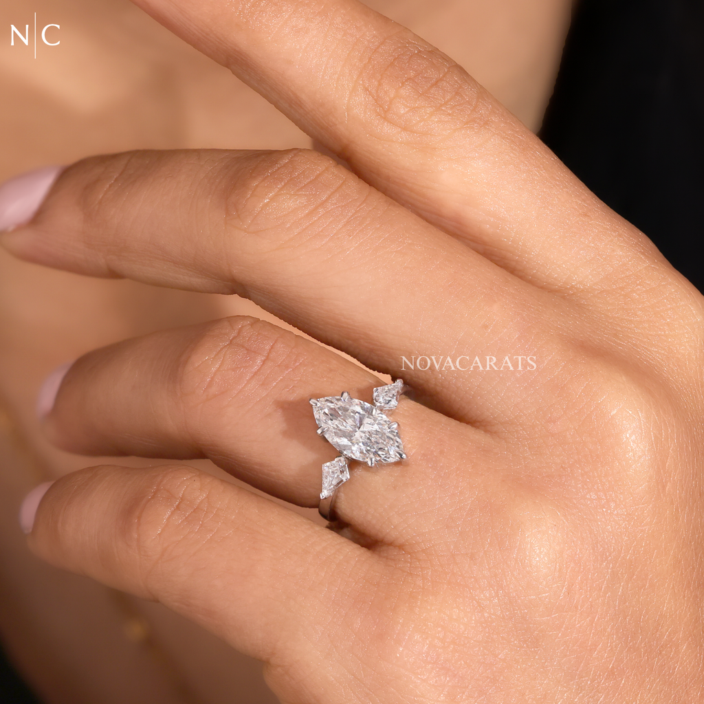 Modern Marquise Kite Side Stone Solitaire Ring