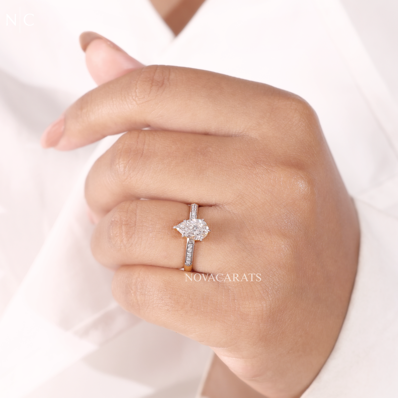 Pear Cut Hidden Halo Solitaire Ring