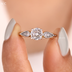 Round Cut Marquise Side Stone Ring