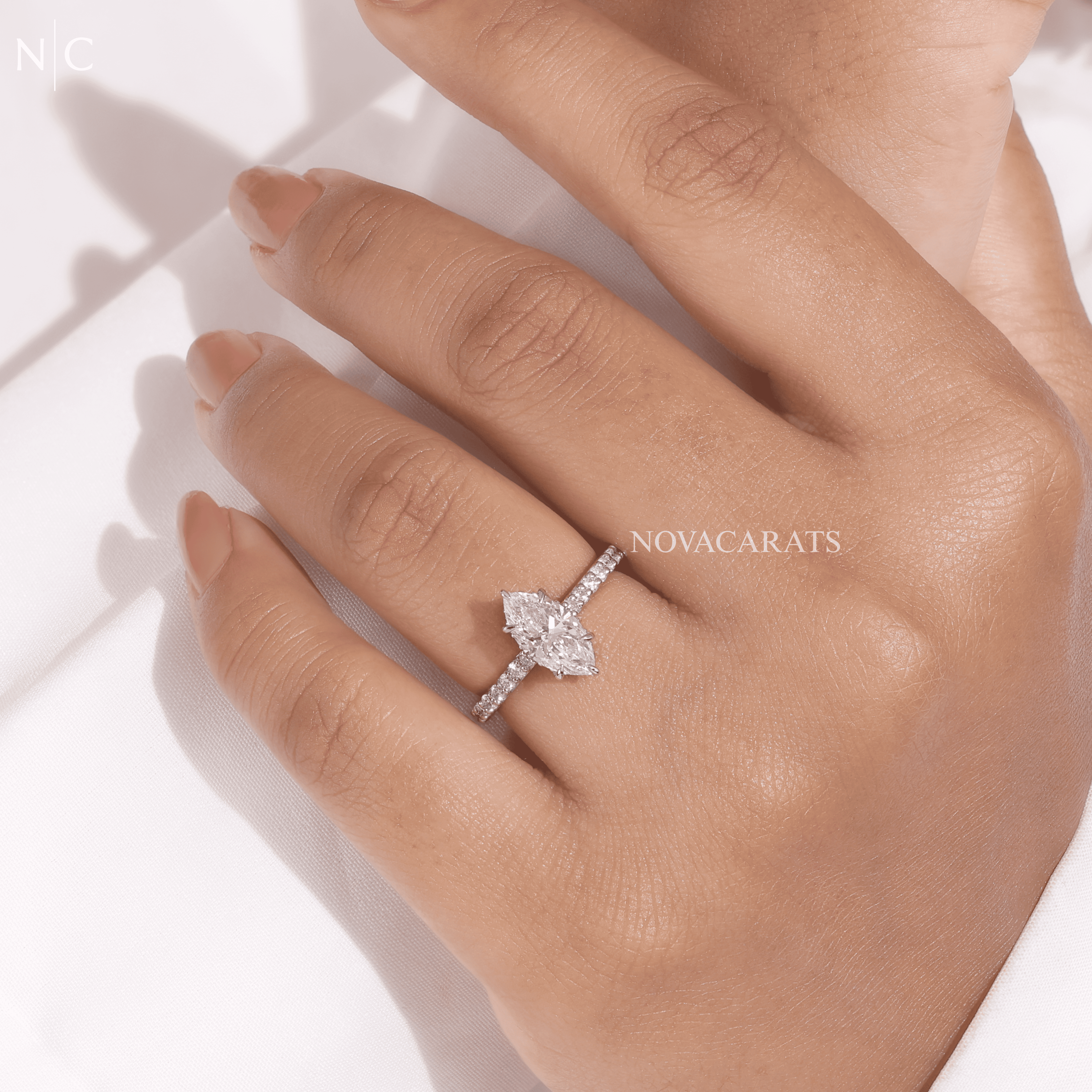 Marquise Cut Unique Hidden Halo Engagement Ring