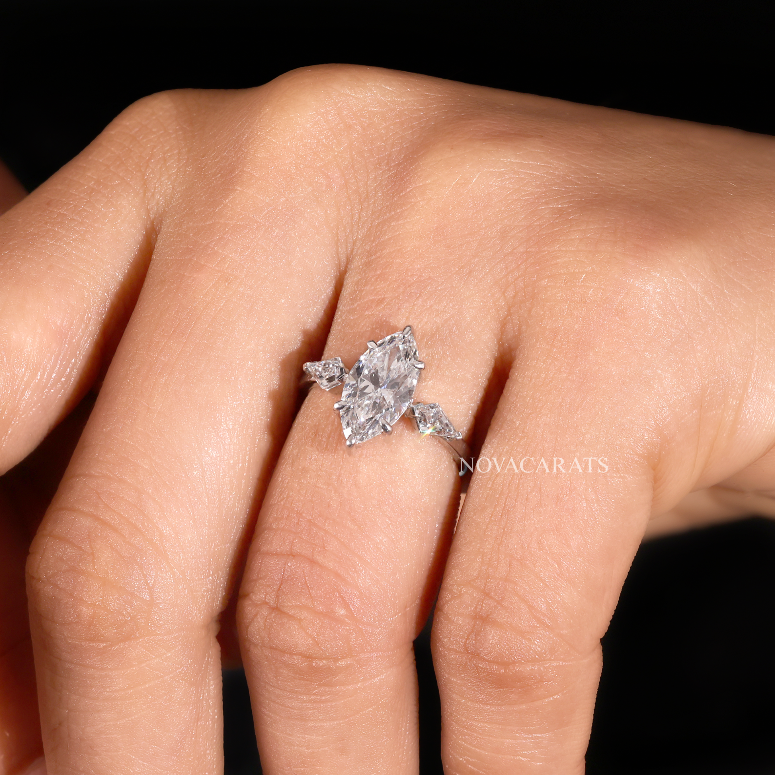 Modern Marquise Kite Side Stone Solitaire Ring